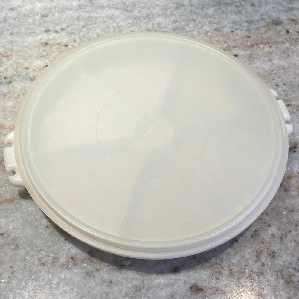 Tupperware 13” round pie keeper/ antipasto server with center section for dip.